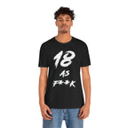 Young man wearing the black 18 AS F**K birthday t-shirt with jeans, front view