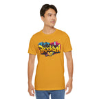 Mustard yellow t-shirt worn by a male model, front view, with graffiti-style Brooklyn AF lettering over a skyline.