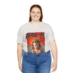 Woman wearing the Vintage White Feral AF T-shirt, cream fabric with the fiery desert print