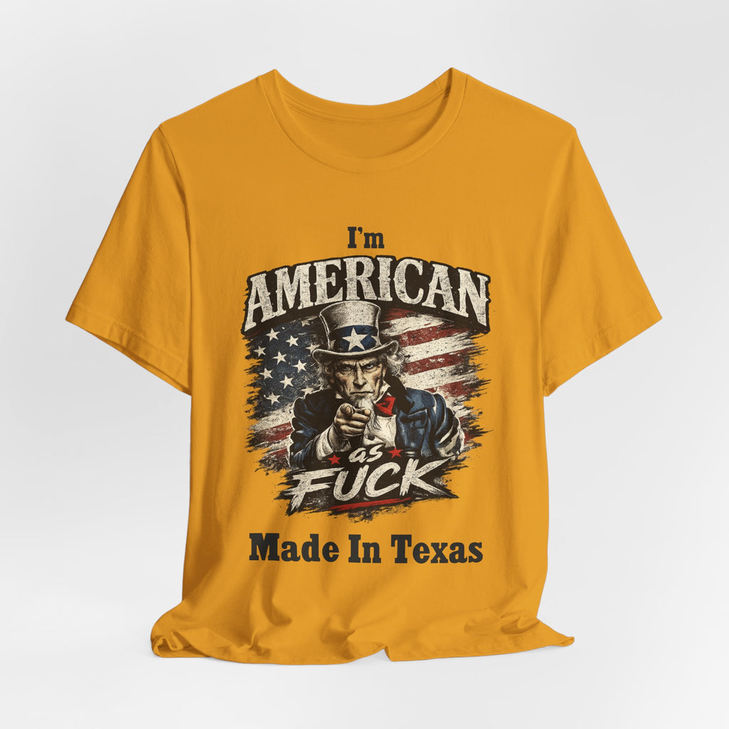 Mustard flat lay tee with Uncle Sam graphic and "I'm American As Fuck, Made In Texas" text