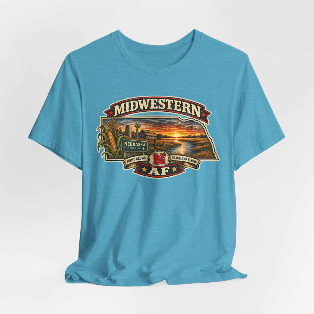 Heather aqua Nebraska T-shirt draped on a soft grey backdrop, front graphic in full detail