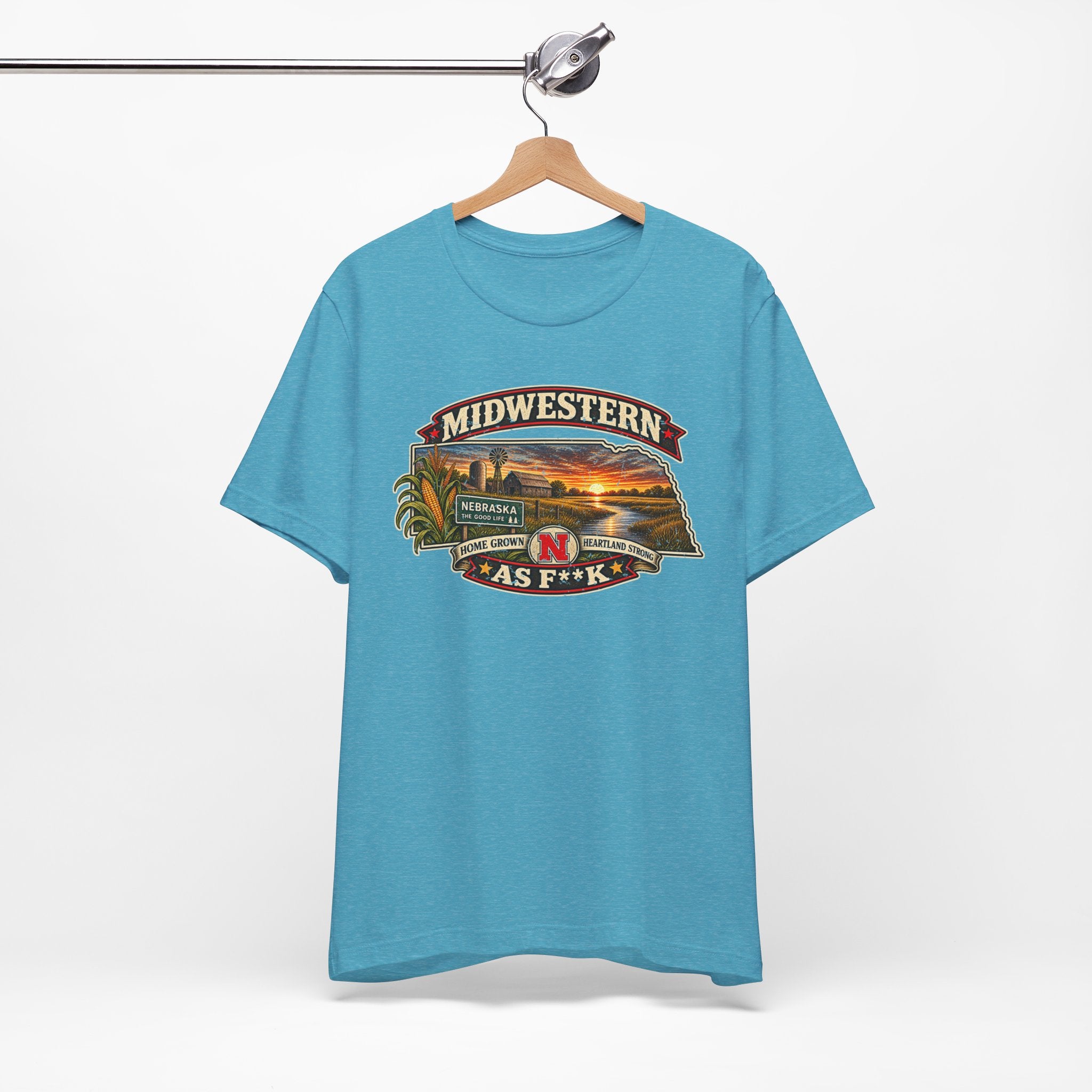 Heather aqua Nebraska As F**K T-shirt on a hanger with the sunset farm badge