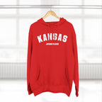 Red custom Kansas hoodie on a wooden hanger, white varsity KANSAS lettering over a sample text line