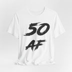 White birthday t-shirt laid flat and rumpled with the black 50 AF print