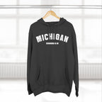 Charcoal Michigan hoodie on a hanger, white varsity MICHIGAN lettering over EDWARDSBURG MI