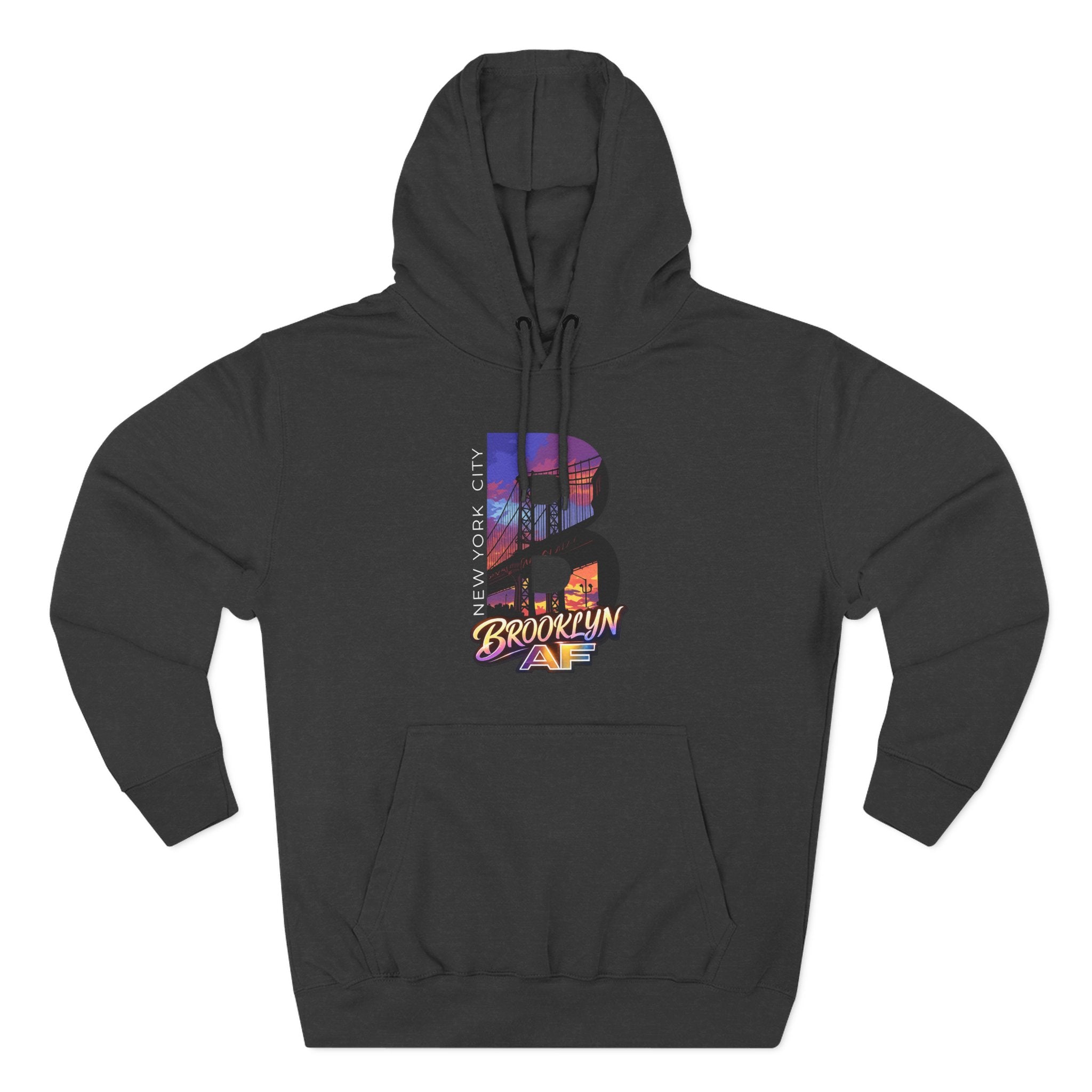 Black hoodie, front-facing flat lay, showing the oversized "B" with a Brooklyn Bridge sunset skyline graphic on the chest.