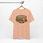 Heather peach Nebraska tee on a wooden hanger showing the Midwestern AF front print