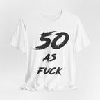 White birthday t-shirt laid flat with the black brush-script 50 AS FUCK print