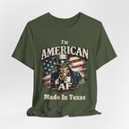 Olive green t-shirt casually draped, showing the Uncle Sam graphic and AF Made In Texas text.