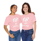 Two women arm in arm in matching pink 18 AS F**K birthday tees