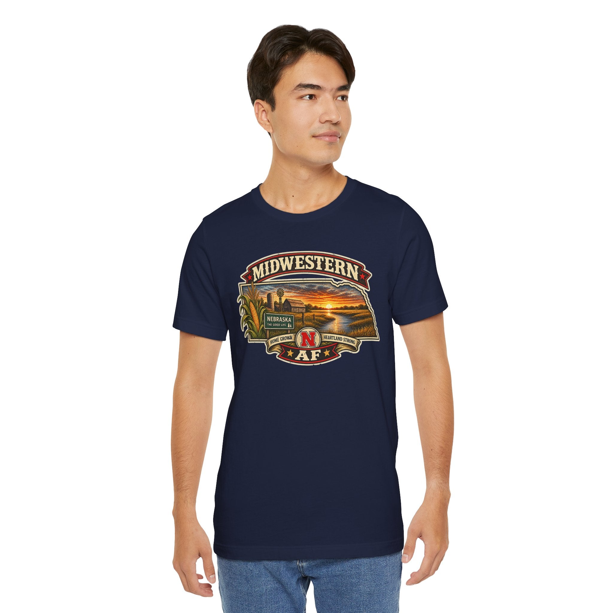 Man wearing the navy Nebraska T-shirt with the vintage Midwestern AF sunset badge printed on the front