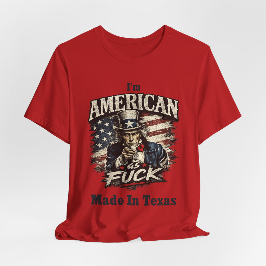 Red flat lay tee with Uncle Sam graphic and "I'm American As Fuck, Made In Texas" text