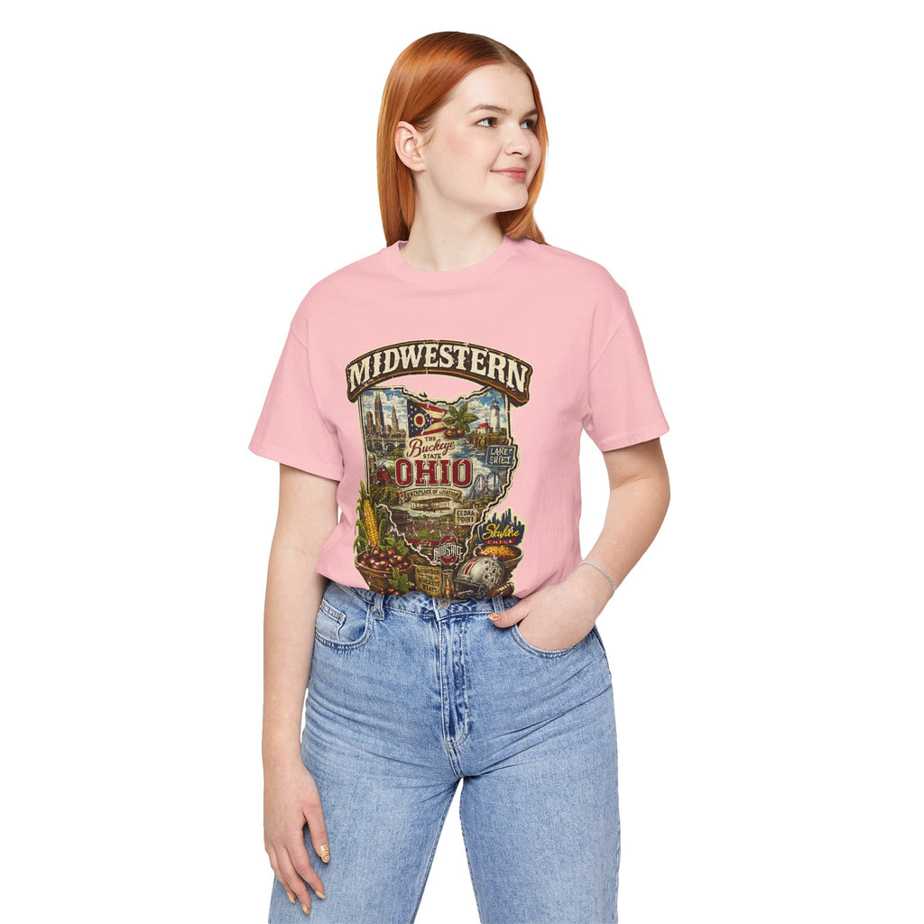 Woman wearing pink Ohio Midwestern As Fuck t-shirt with Buckeye State graphic, hand in pocket