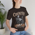 Woman by a houseplant in the Brown Country AF tee