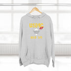 Woman wearing the Personalized USMC Marine Corps AF hoodie in Heather Grey beside a sunlit window