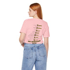 Woman wearing the Army veteran T-shirt in Pink, back view showing the VETERAN acrostic print