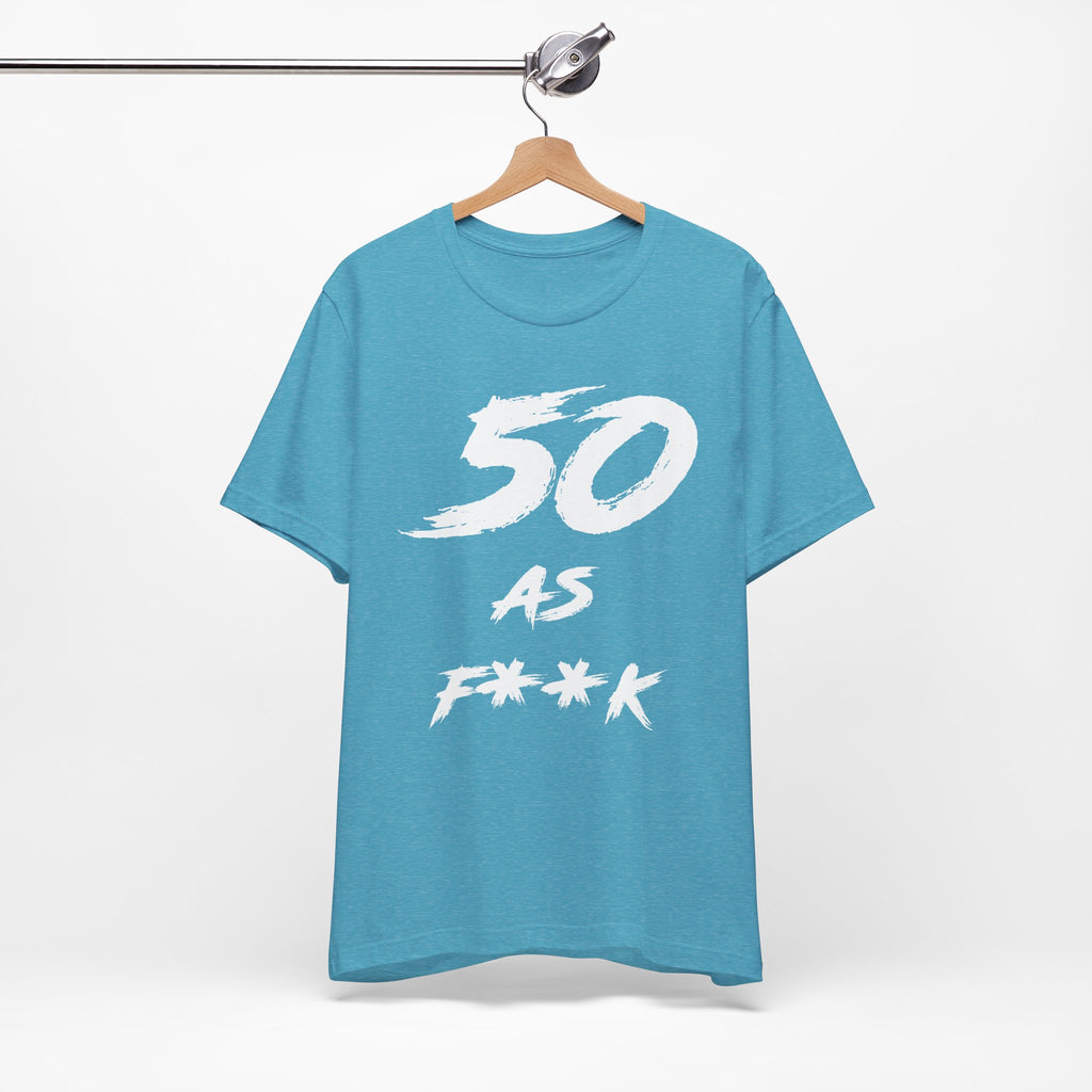 Heather Aqua birthday tee hanging on a hanger, white 50 AS F**K graphic facing front