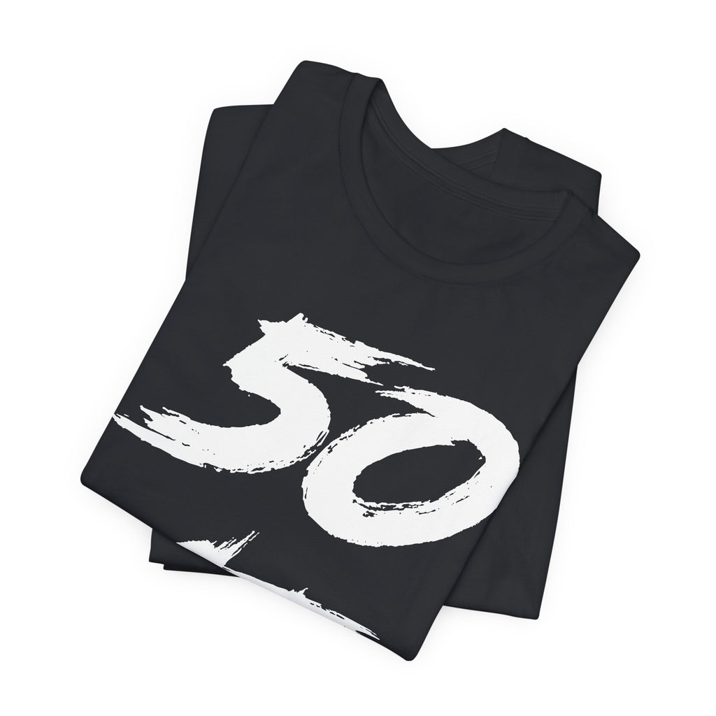 Folded Vintage Black tees stacked with the white 50 print across the top fold