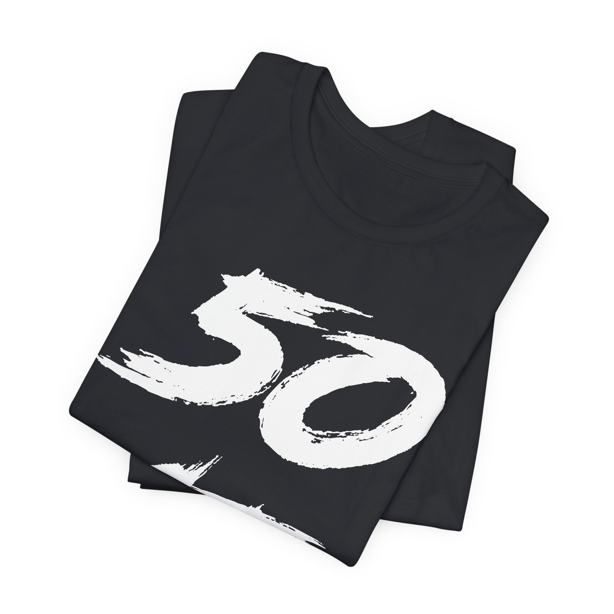 Folded Vintage Black tees stacked with the white 50 print across the top fold