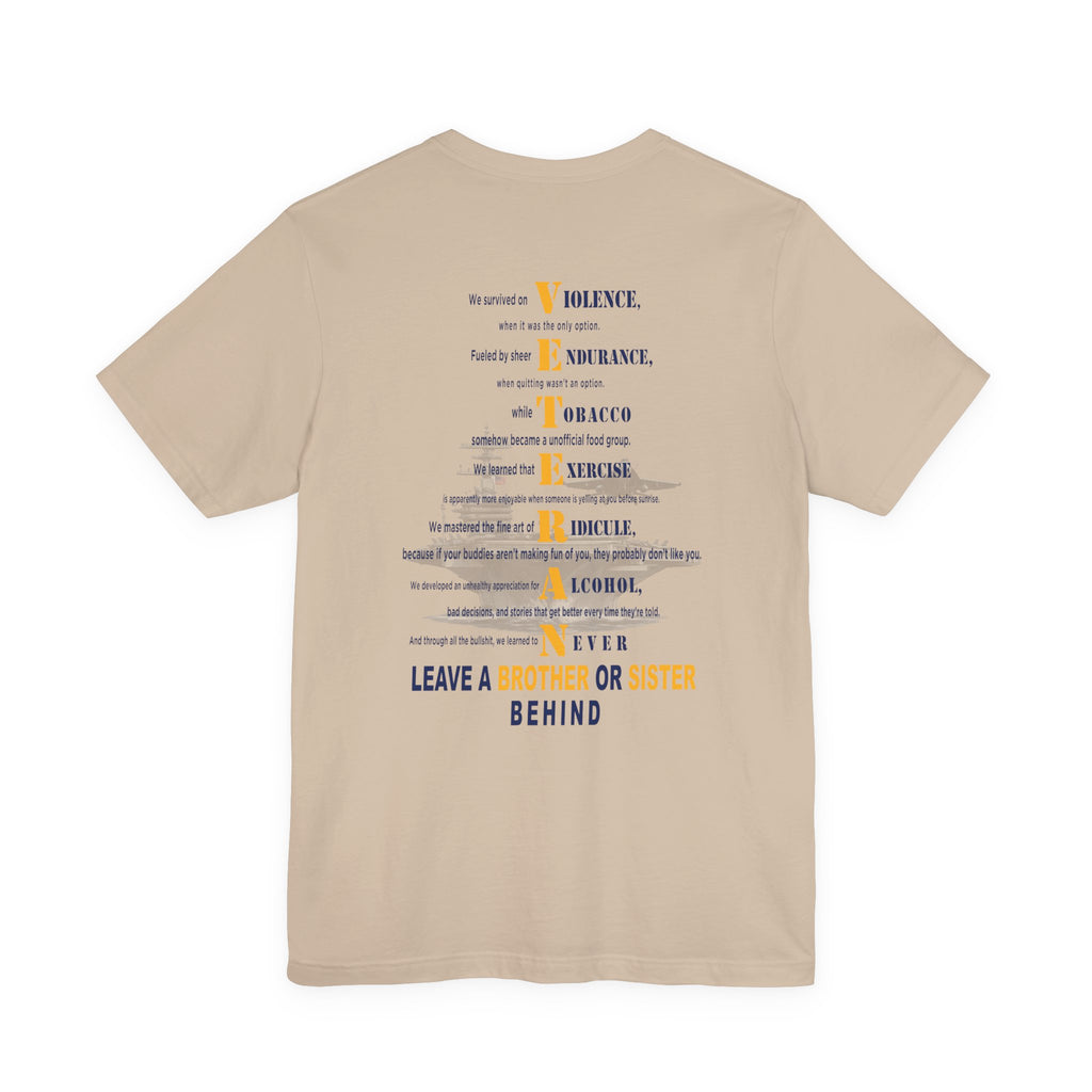 Navy veteran tee in Tan with the VETERAN acrostic back print over a faded aircraft carrier