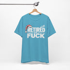 Heather Aqua Retired As Fuck tee on a wooden hanger showing the front print
