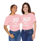 Two women together in matching pink 50 AS F**K birthday tees
