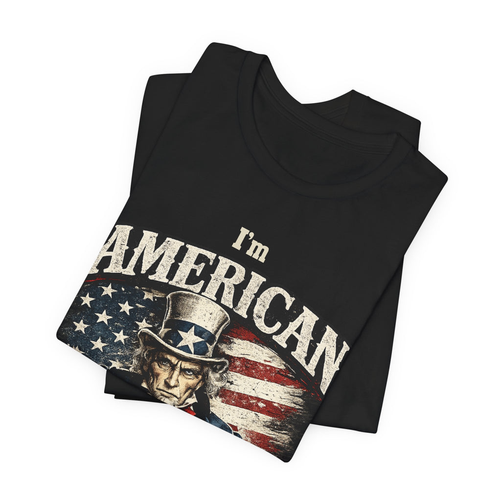 Black t-shirt folded into a stack, top fold showing the Uncle Sam graphic and I'm American lettering.