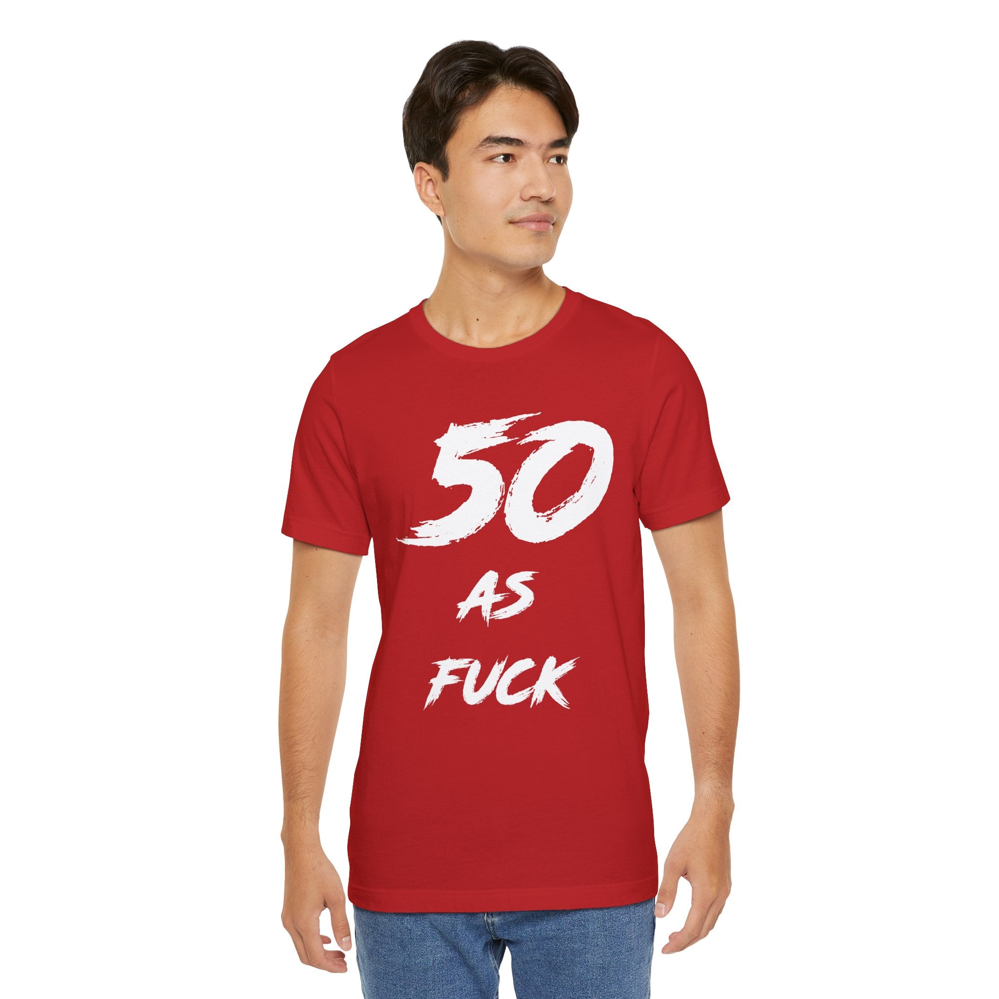 Man wearing the red 50 AS FUCK birthday tee with jeans
