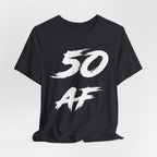 Vintage Black birthday t-shirt laid flat and rumpled, white 50 AF chest graphic