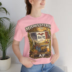Family Friendly Midwestern AF Iowa T-Shirt – product photo 3 featuring a distressed vintage design featuring the outline of Iowa overlaid with the Iowa state flag, surrounded by towering corn stalks, rolling farmland, a classic red barn, a windmill, a tractor, and an overflowing harvest basket