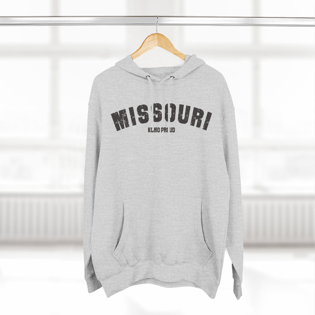 Heather grey personalized Missouri hoodie on a hanger, varsity MISSOURI above a KCMO PROUD line