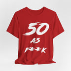 Red birthday t-shirt laid flat and slightly rumpled, white 50 AS F**K graphic