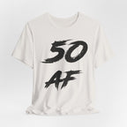 Vintage White birthday t-shirt laid flat with the black 50 AF brush lettering