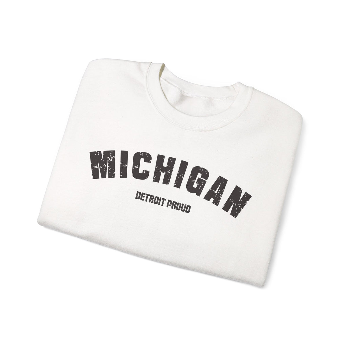 White Michigan sweatshirt folded, showing the distressed MICHIGAN arch and DETROIT PROUD line