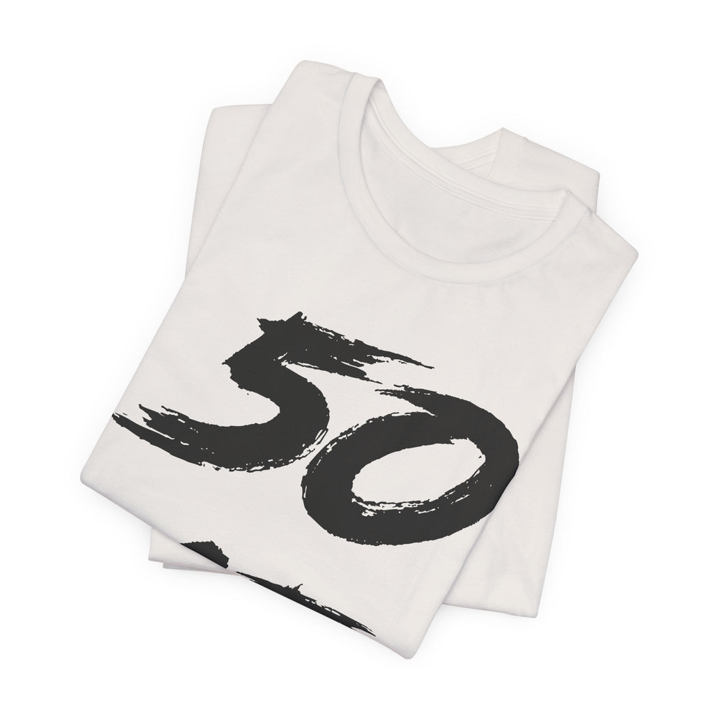 Folded Vintage White tees stacked, black 50 print visible on the top fold