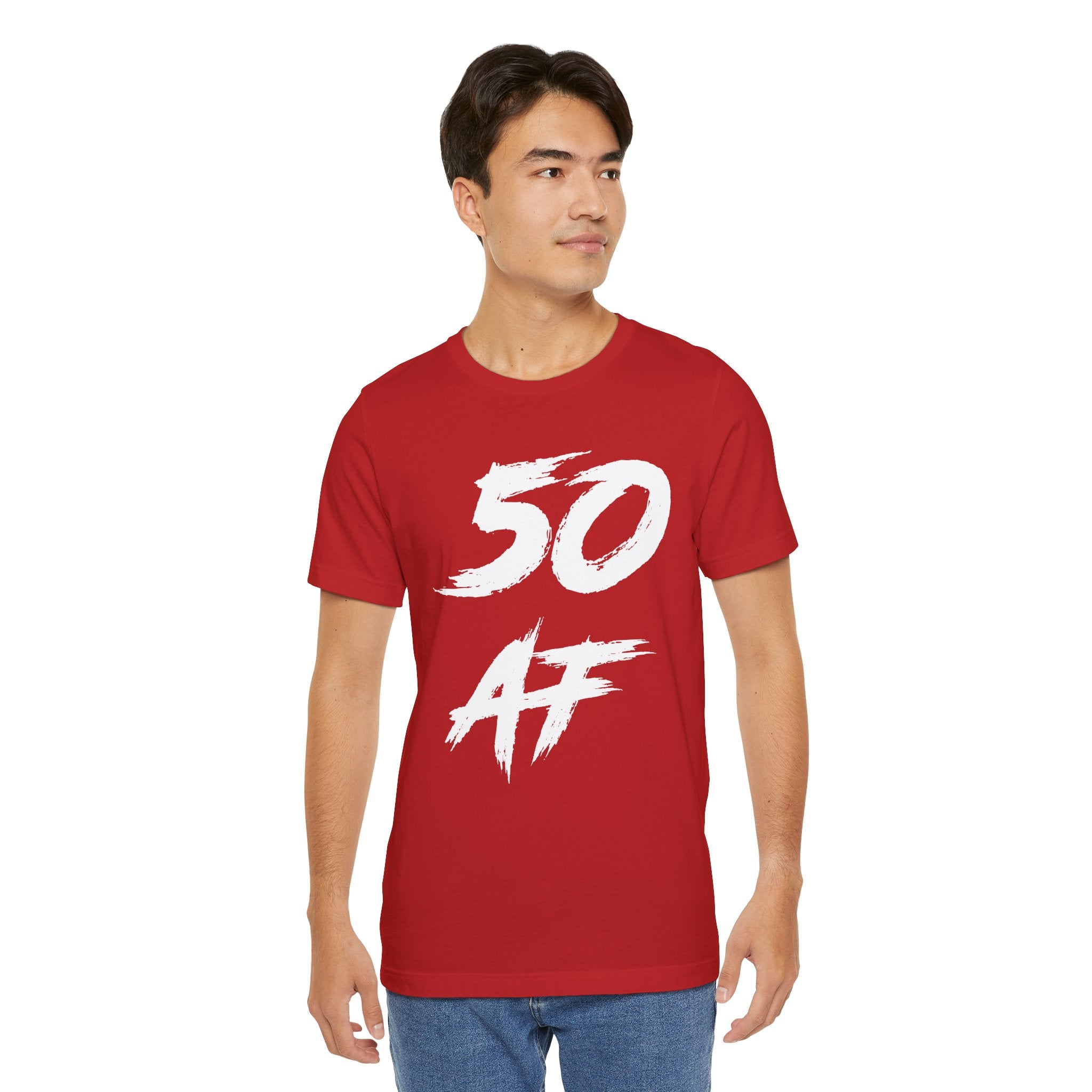 Man wearing the red 50 AF birthday tee with jeans