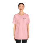 Woman wearing the personalized Army veteran T-shirt in Pink, full-length studio shot