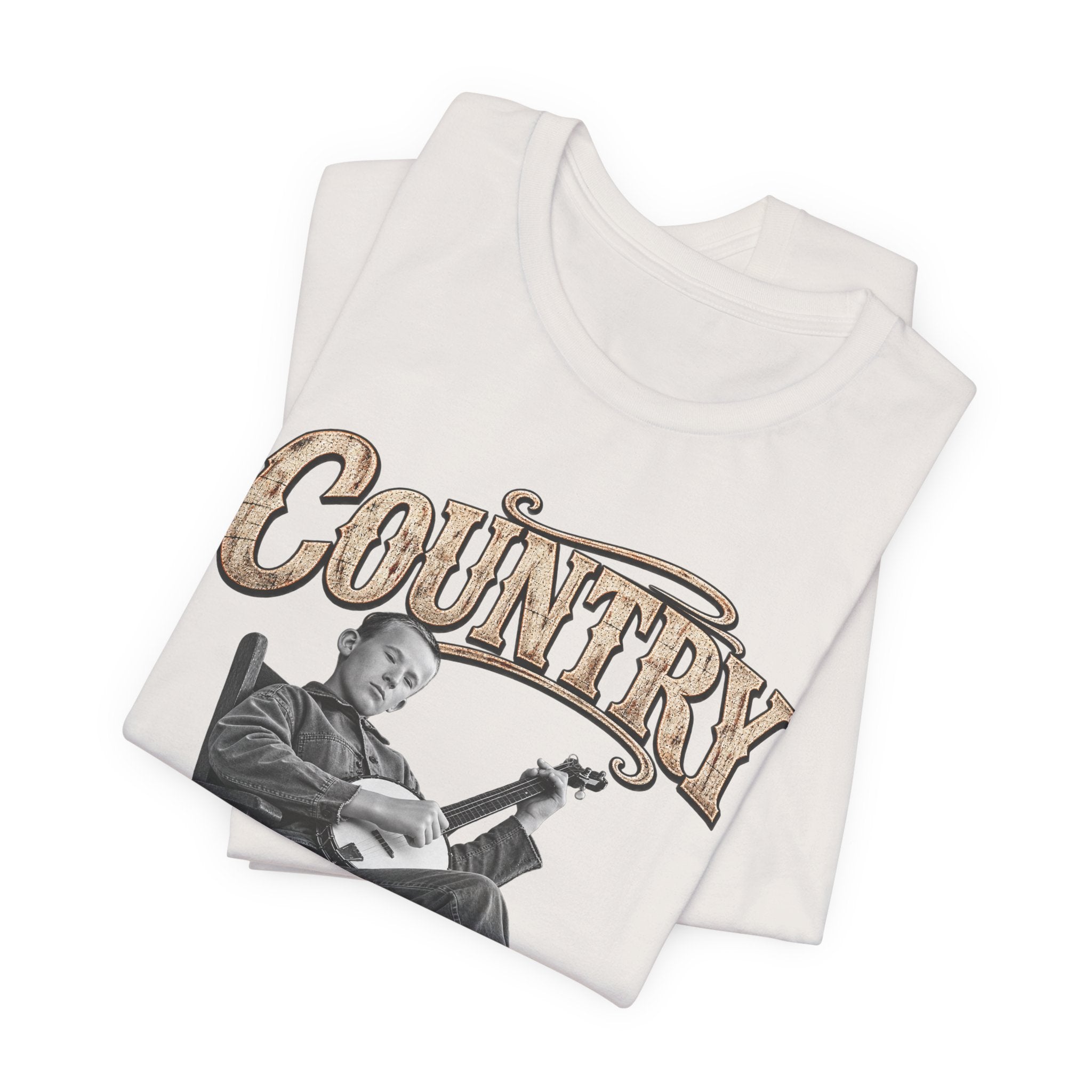 Vintage White Country AF tee folded in a stack, country graphic on top