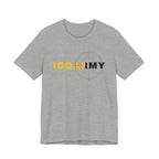 Light grey IDGAF Army tee laid flat, gold and charcoal lettering over a pale target ring