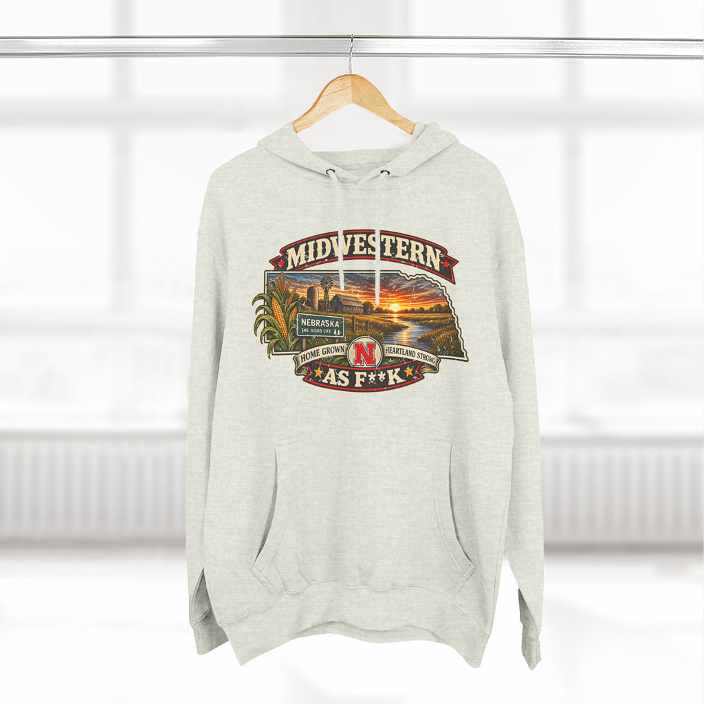 Oatmeal heather Nebraska As F**K hoodie hanging by a window, front print on show