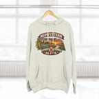 Oatmeal heather Nebraska As F**K hoodie hanging by a window, front print on show