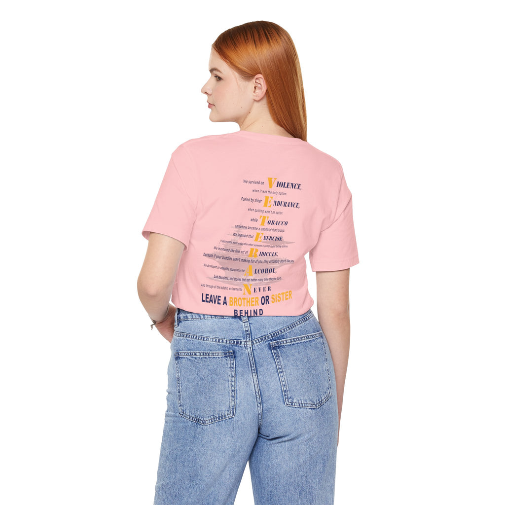 Woman in Pink, back view: VETERAN acrostic print over a faded aircraft carrier
