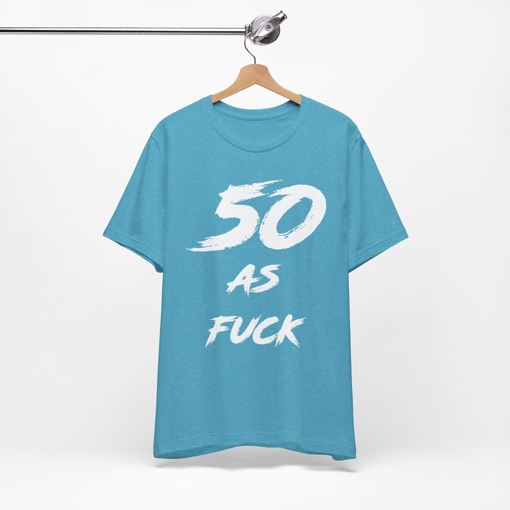Heather Aqua birthday tee hanging on a hanger, white 50 AS FUCK graphic facing front