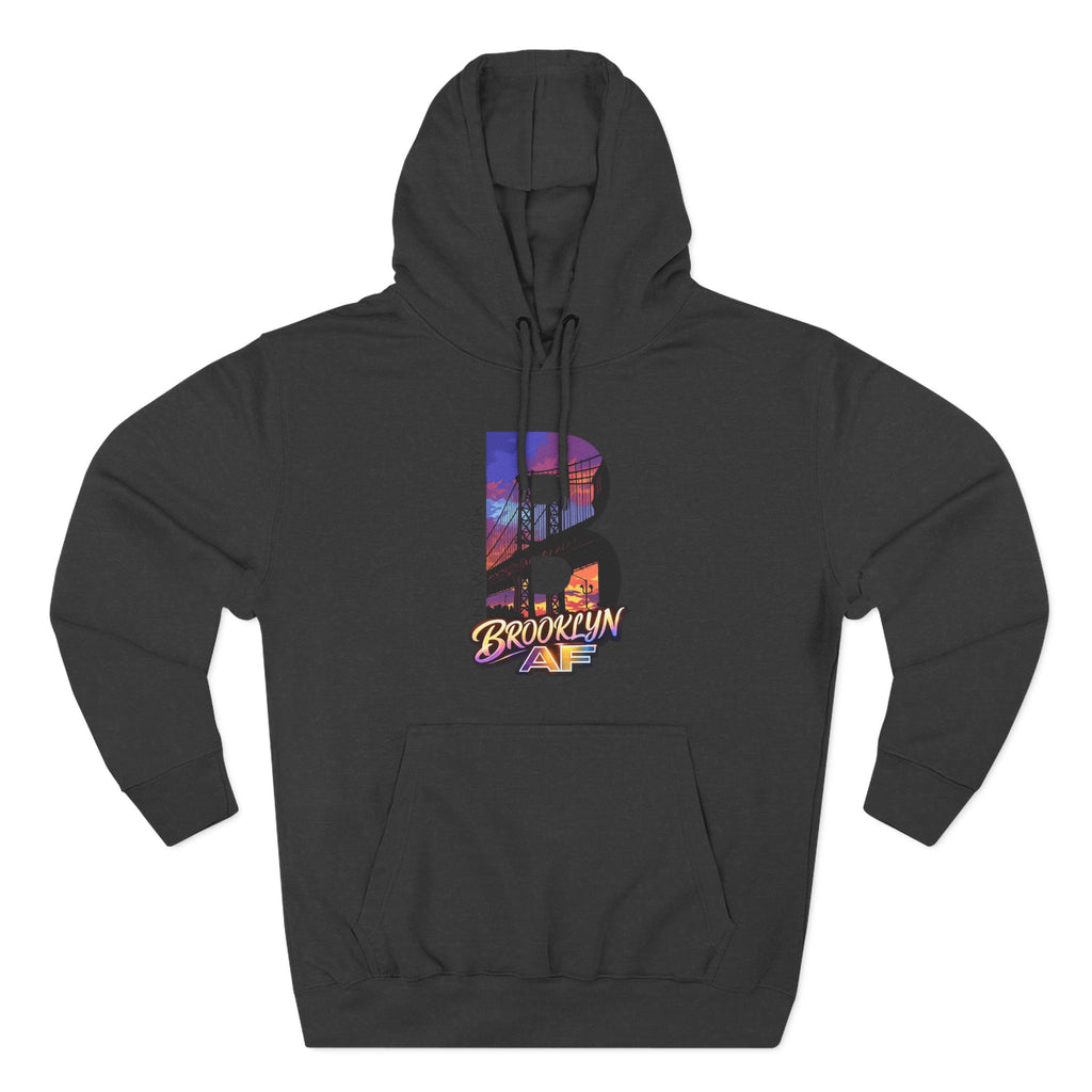 Black hoodie, flat lay front view, oversized B with a colorful Brooklyn Bridge sunset skyline graphic and Brooklyn AF logo.