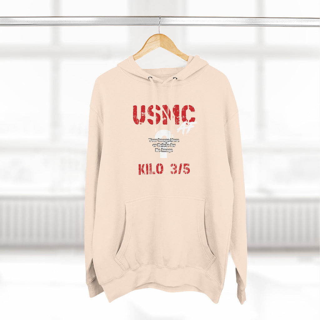 Personalized USMC Marine Corps AF hoodie in Sandshell on a wooden hanger in a bright room