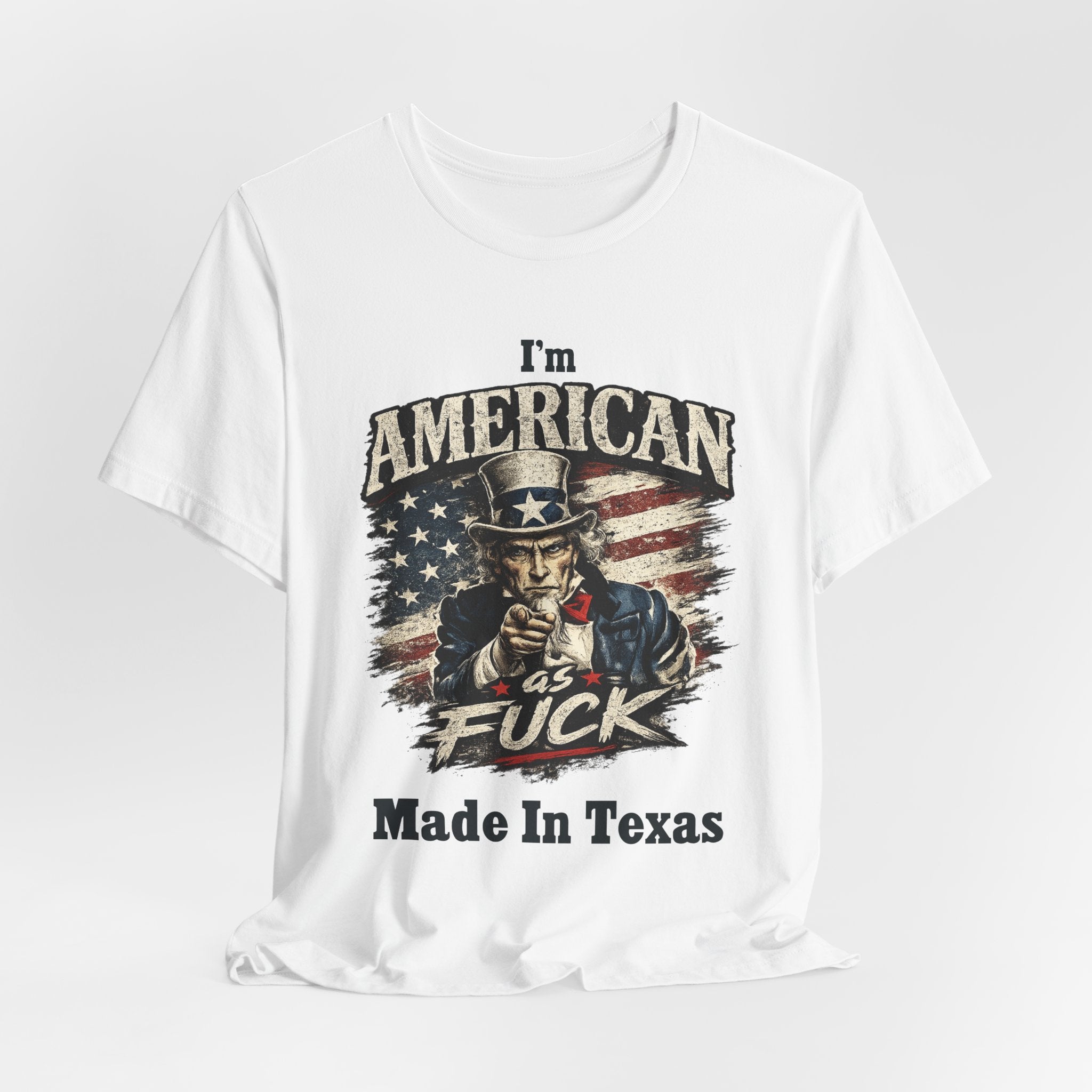 White folded tee close-up showing top of Uncle Sam graphic and "I'm American" text