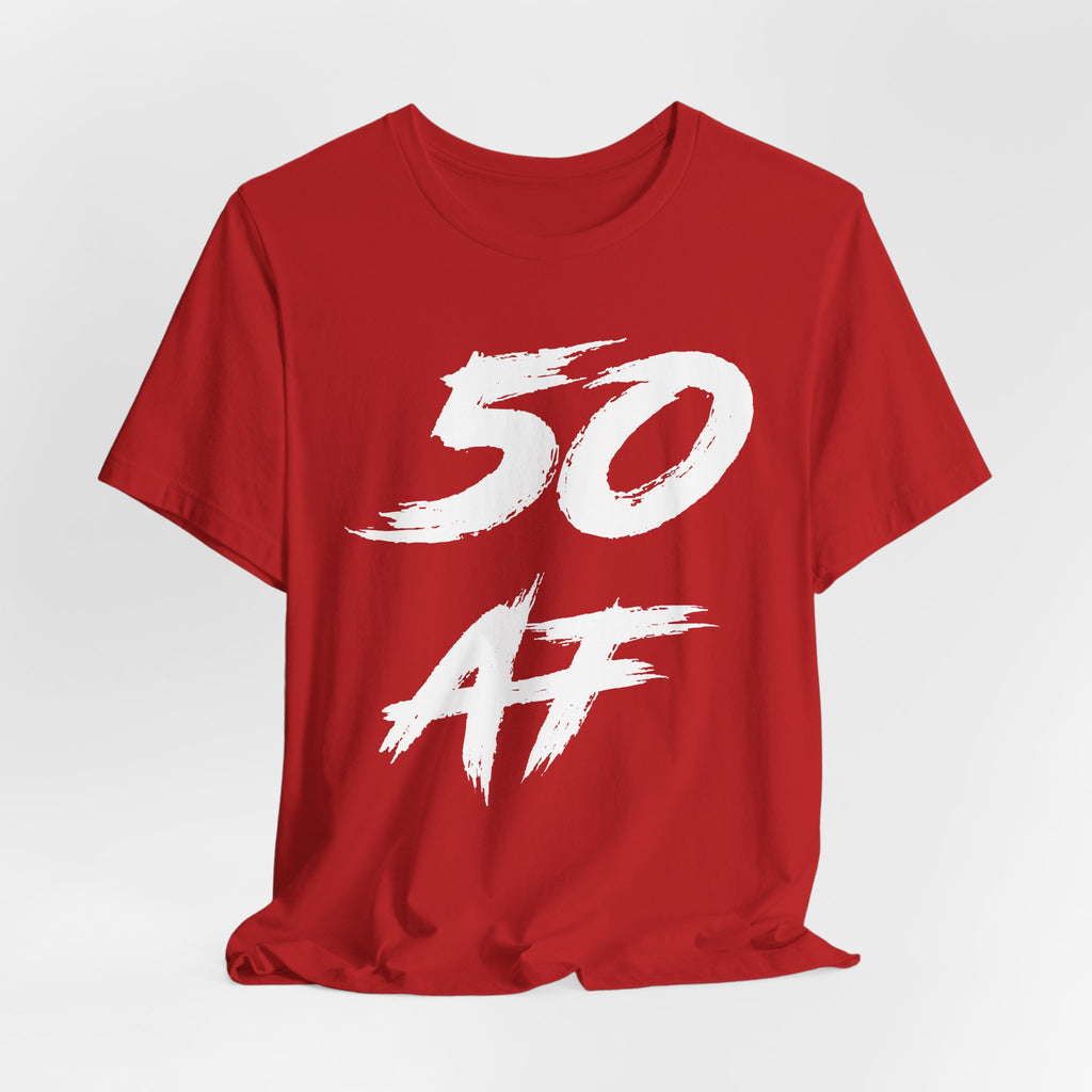 Red birthday t-shirt laid flat and slightly rumpled, white 50 AF front graphic