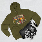 Army green Nebraska As F**K hoodie flat-lay styled with dark jeans and sneakers