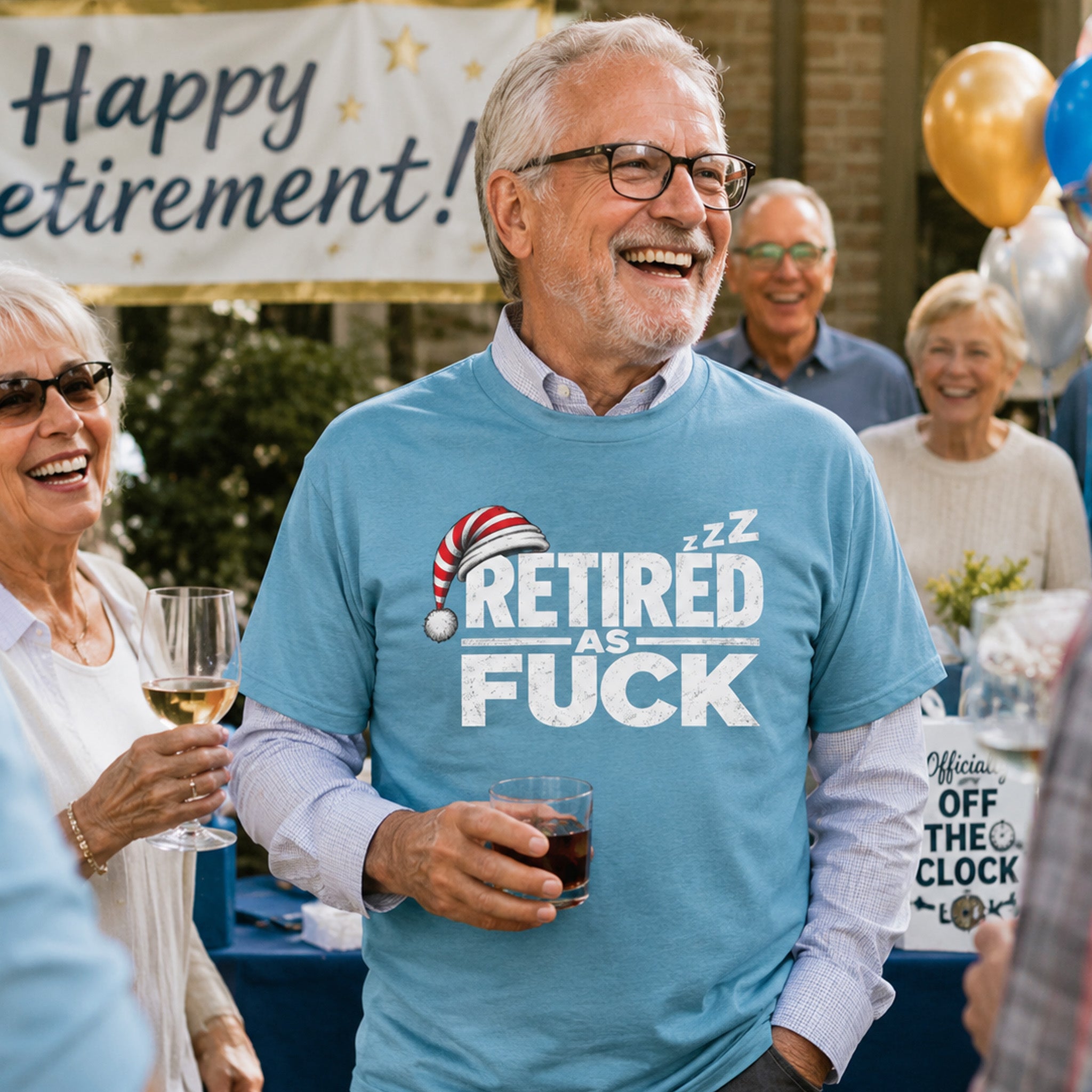Man in the Heather Aqua Retired As Fuck tee laughing at an outdoor retirement party under a Happy Retirement banner