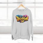 Heather Grey Brooklyn AF graffiti hoodie on a wooden hanger by a window